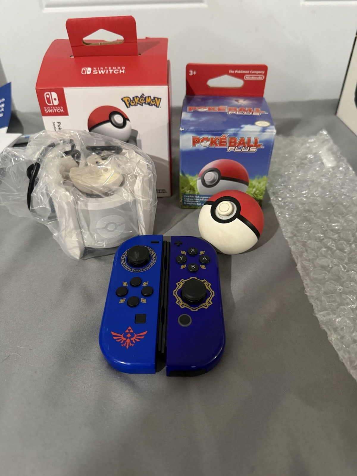 Skyward Sword Joycons, Pokeball Plus And Hori Pokeball Plus Charger.