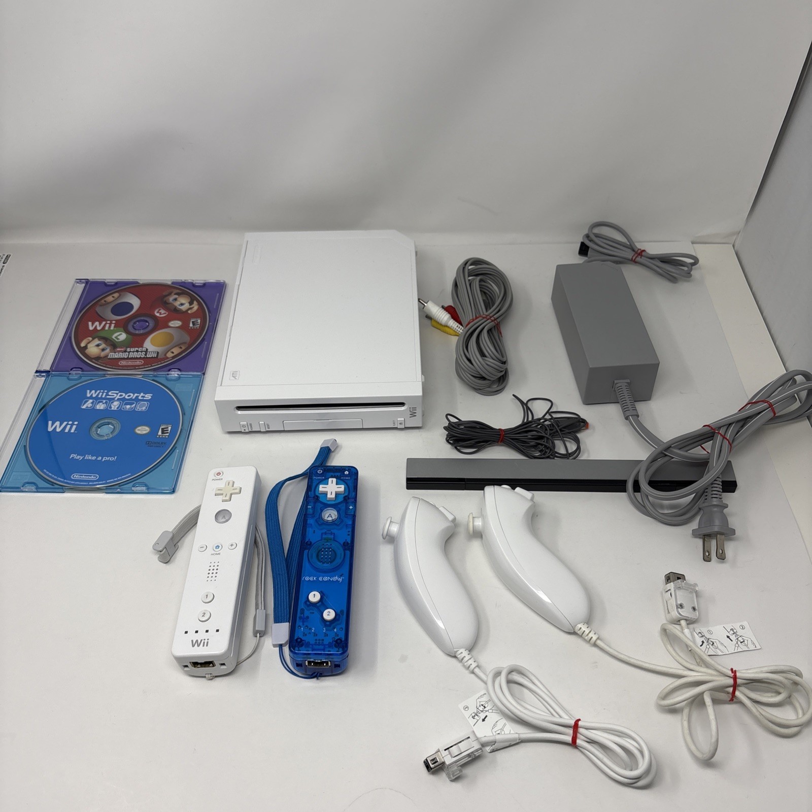 Nintendo Wii Console Bundle w/ 2 Remotes – 2 Nunchuks – Wii Sports – Mario
