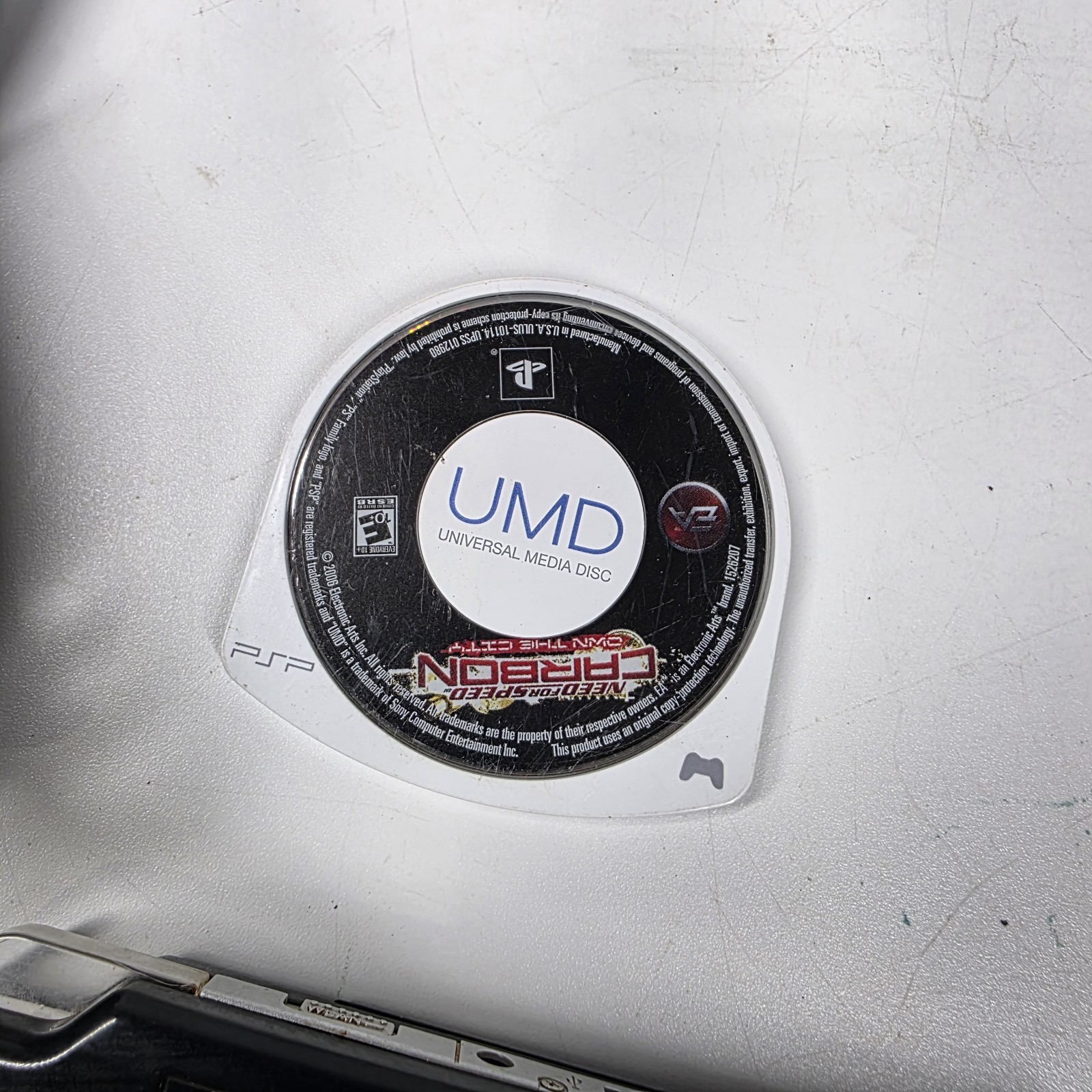 Sony PSP-2001 Slim Edition Black w/ Charger & Need For Speed Carbon – No Battery