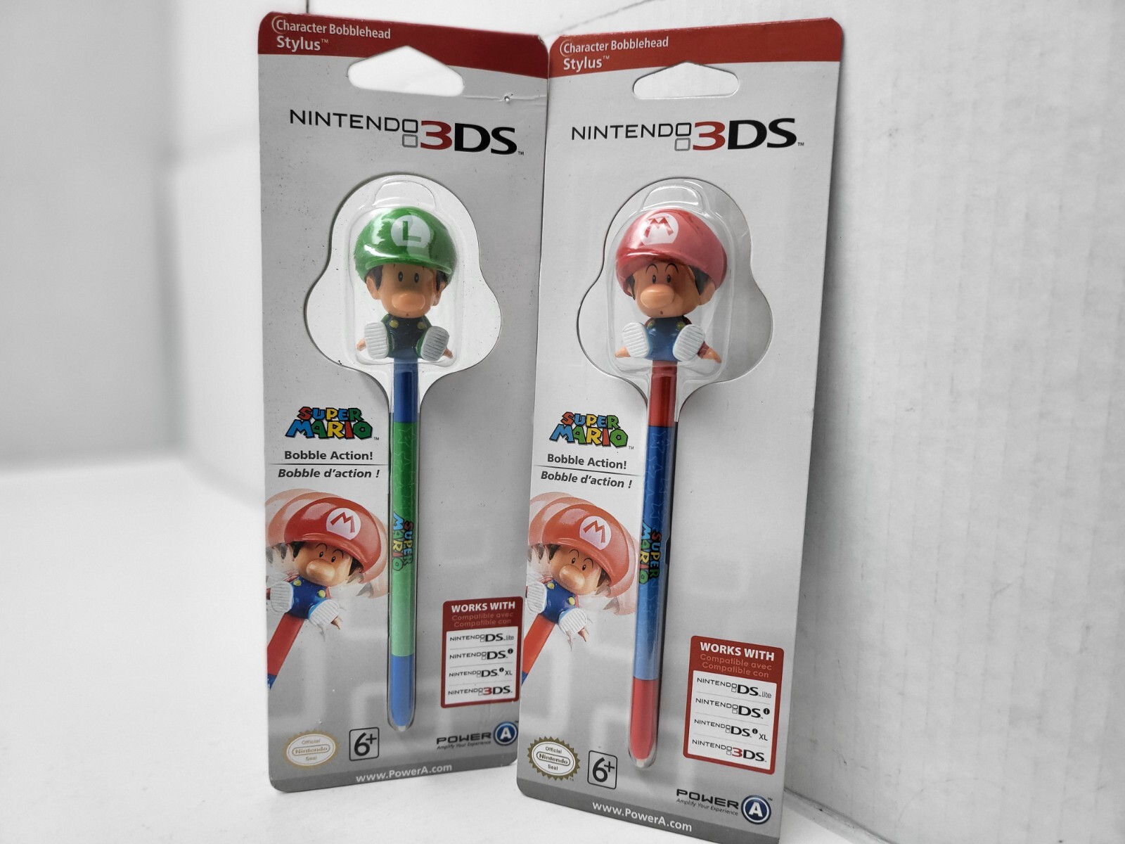 2 NEW LARGE BOBBLE HEAD STYLUS 1 SUPER MARIO BROS. & 1 LUIGI BOBBLEHEAD