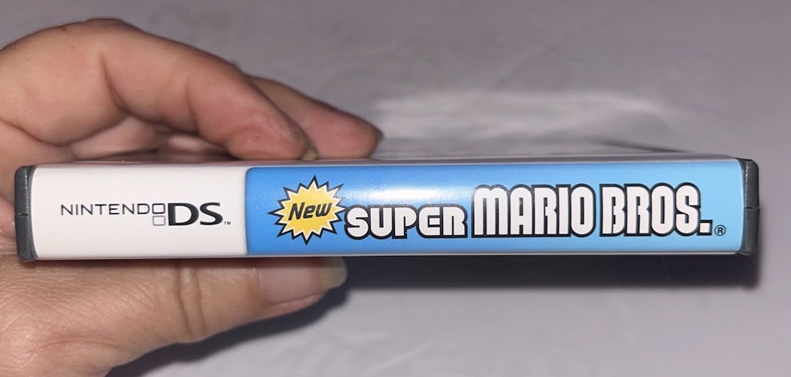 NEW SUPER MARIO BROS. NINTENDO DS GAME WITH CASE AND MANUAL Not Tested