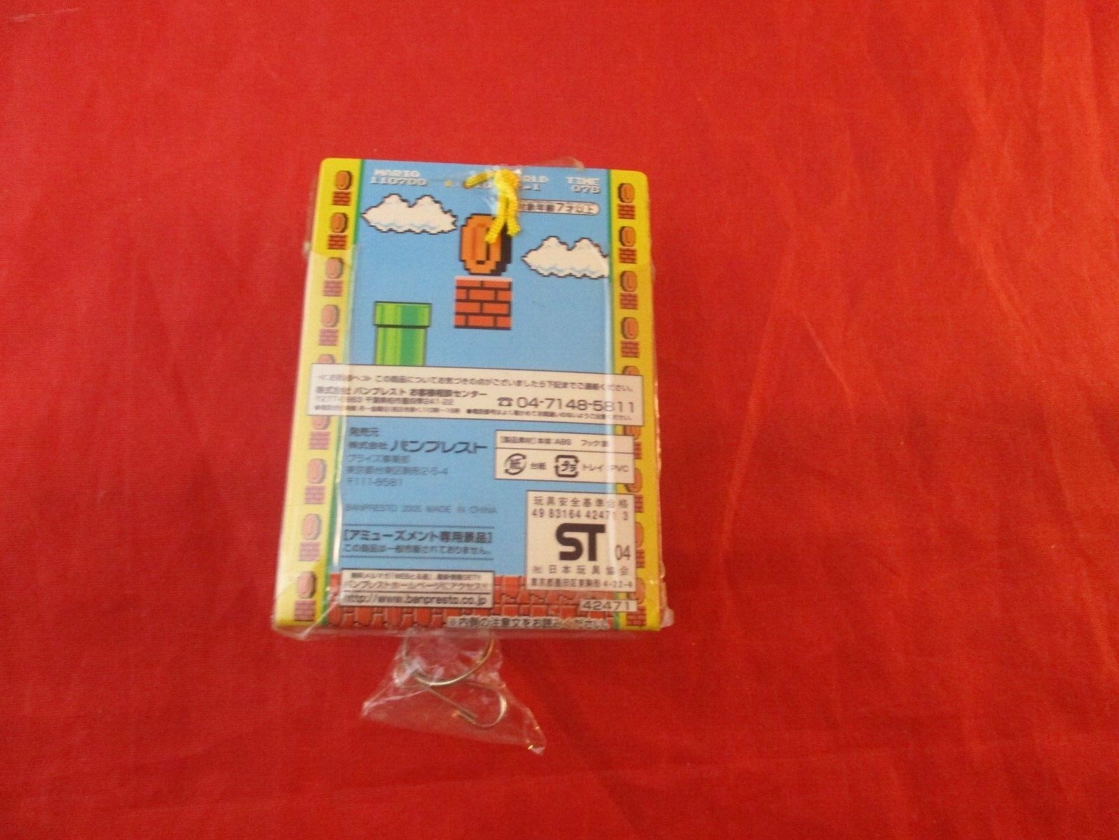 Small Mario Nintendo Retractable ID Holder Keychain w/Popup Coin NES Mario Look