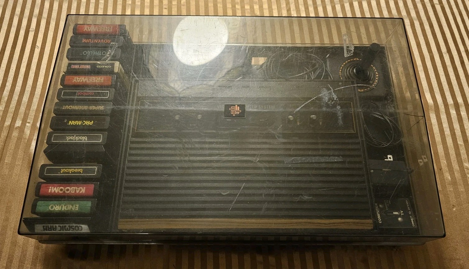 ATARI BUNDLE WITH SYSTEM, CONTROLLERS, CASE, GAMES, BOOKS, HOOKUPS CX-2600A