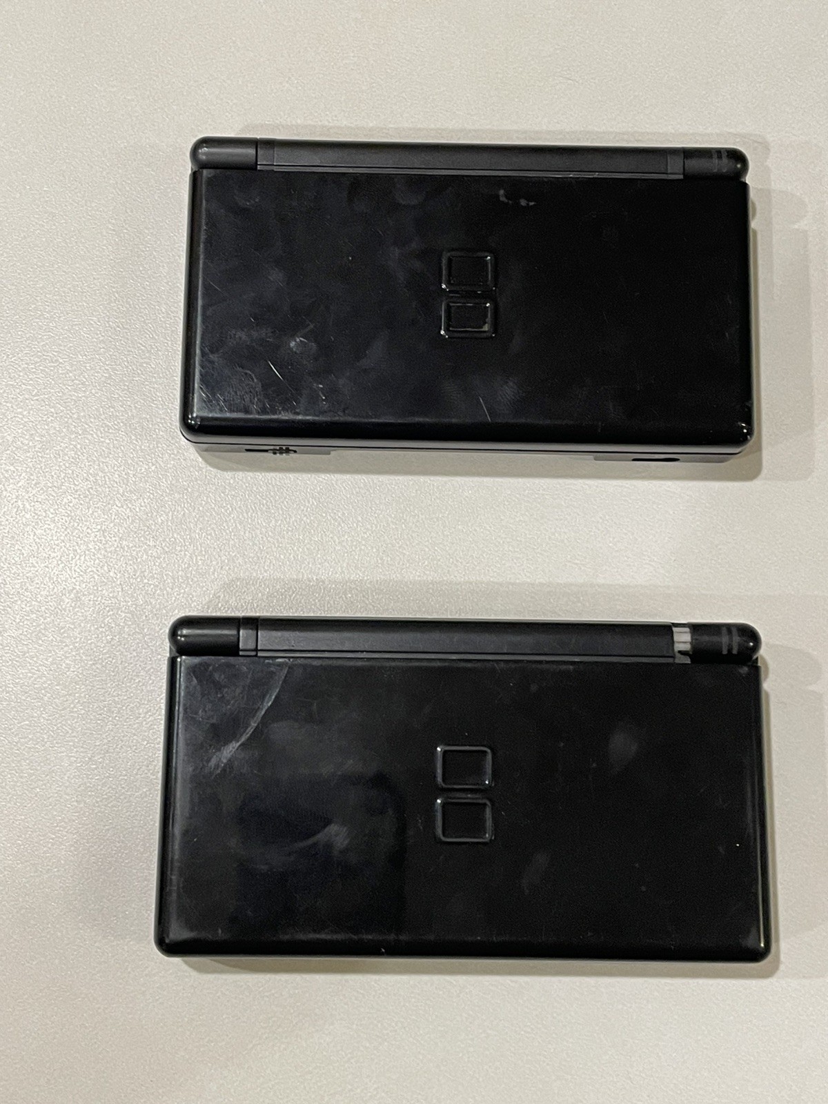 2 Nintendo DS Lite -Black. For Parts/Not Working. No Charger.