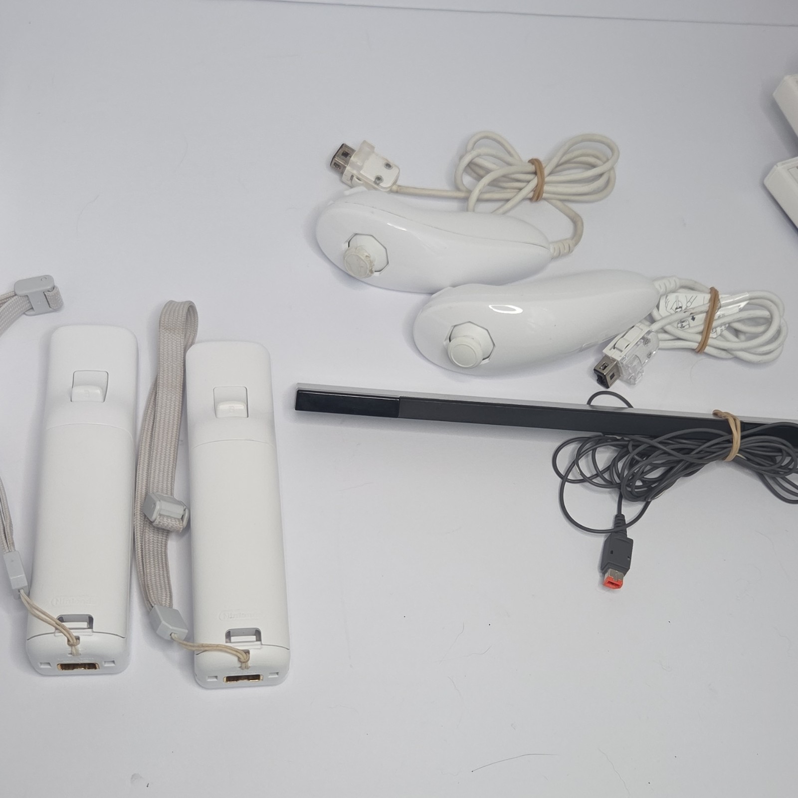 Nintendo Wii Console Bundle w/ 2 Remotes, 2 Nunchuks, Sensor Bar NTSC-U/C