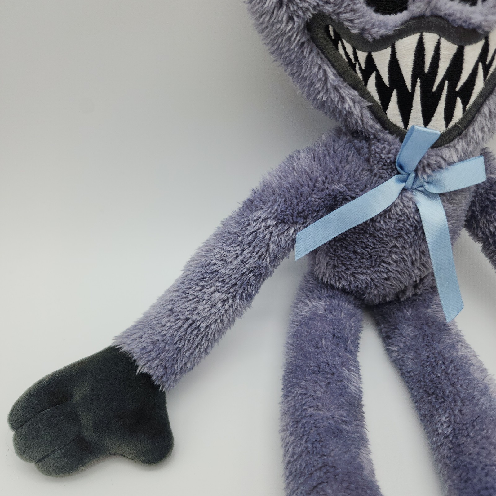 Official Poppy’s Playtime Grey Stitched Huggy Wuggy Plush Toy with Blue Bow