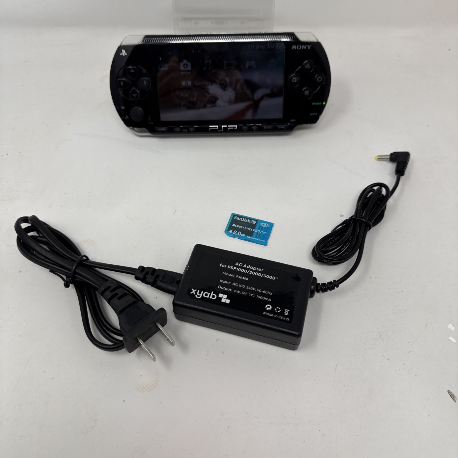 PSP-1001 Black Sony PlayStation Portable- New Battery, Charger, 2gb Memory