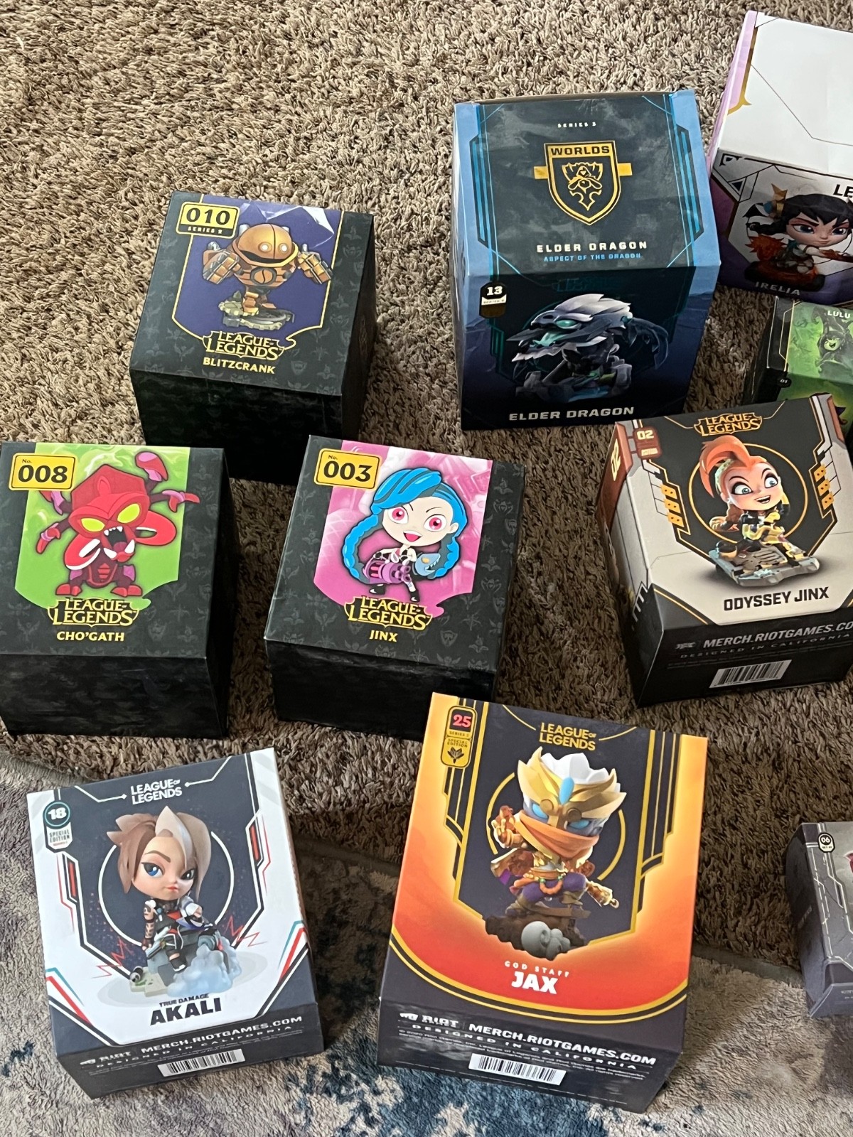 huge lot of league of legends statues