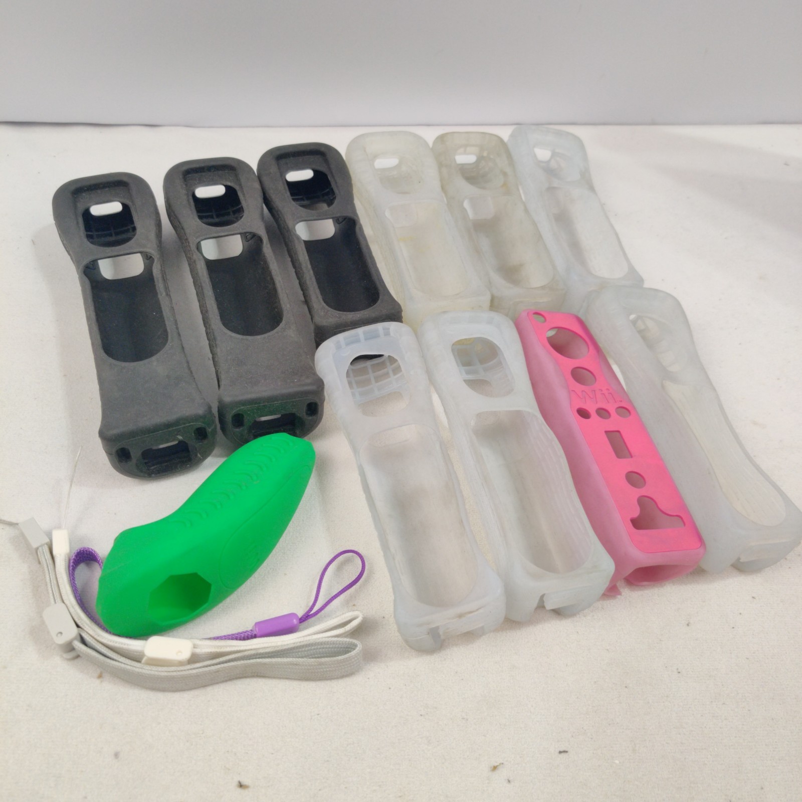 Lot of 11 OEM Nintendo Wii Remote Rubber Silicone Gel Cover Sleeves + Extras