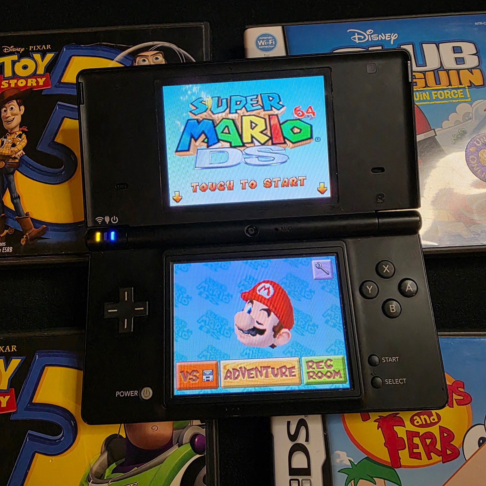 Nintendo DSi Black Lot with Charger, 20 Games, Hardshell Case, and Carrying Case