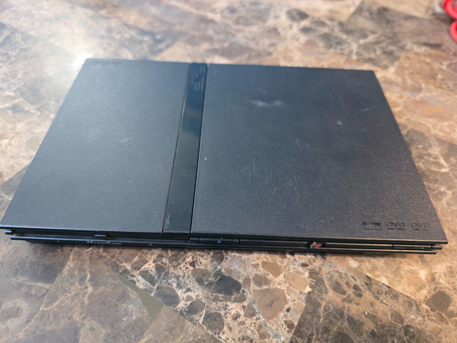 PS2 Slim Console + 13 games+Guncon+ SF Controller + Xmen vs Street Fighter etc.