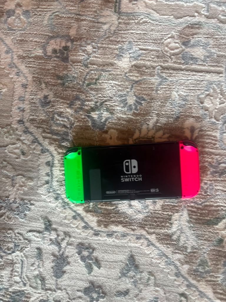Nintendo Switch Handheld Console – Pink/Green joycons- Used