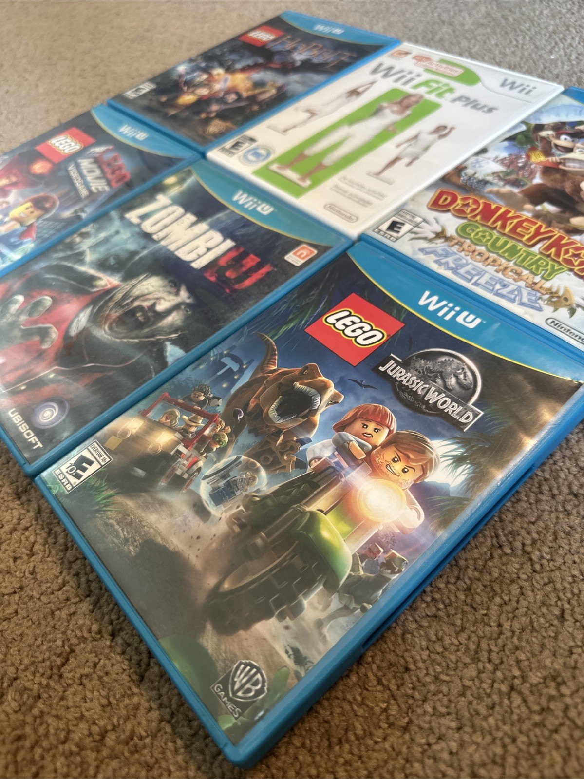 WiiU Game Bundle With Six Games ZombiU, Three Lego Titles, Donkey Kong Country