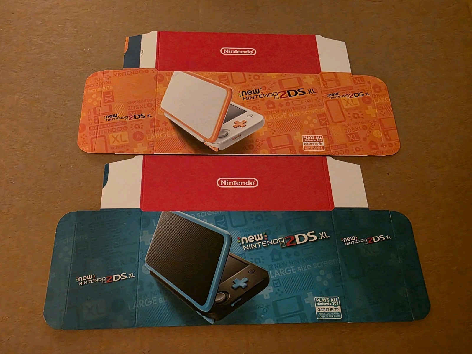 New 2DS XL White/Orange and Blue/Black Boxes – FOR DISPLAY ONLY