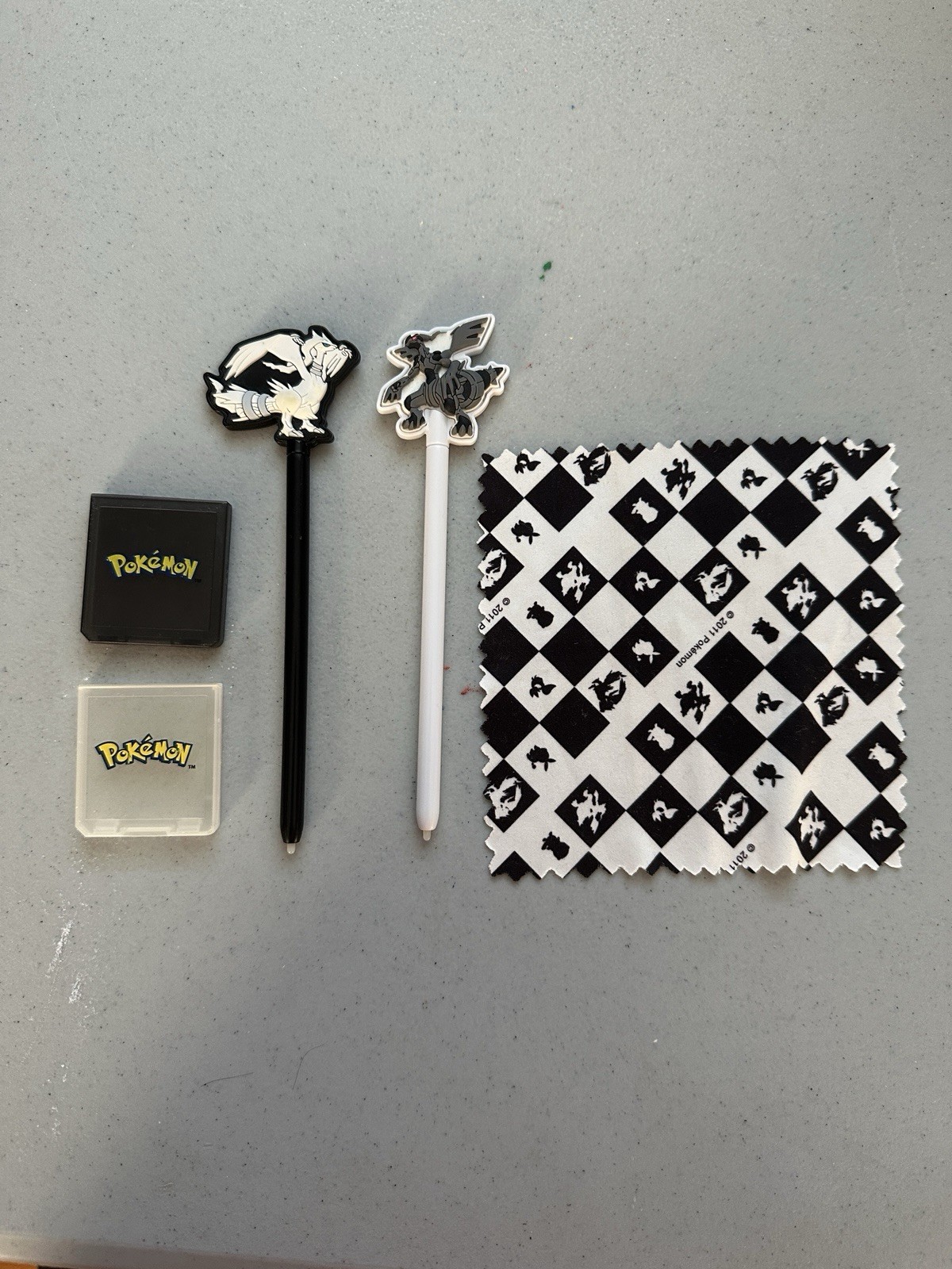 2011 Pokemon Black And White Nintendo DS Styluses, Cases And Cleaning Cloth Used