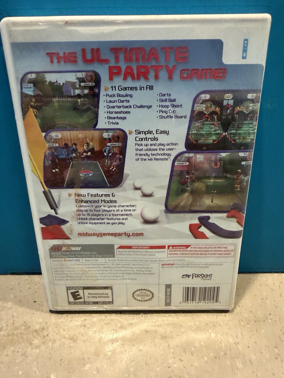 Original Nintendo Wii Bundle- Consol, Wii Sports, Game Party 2, And Controllers.