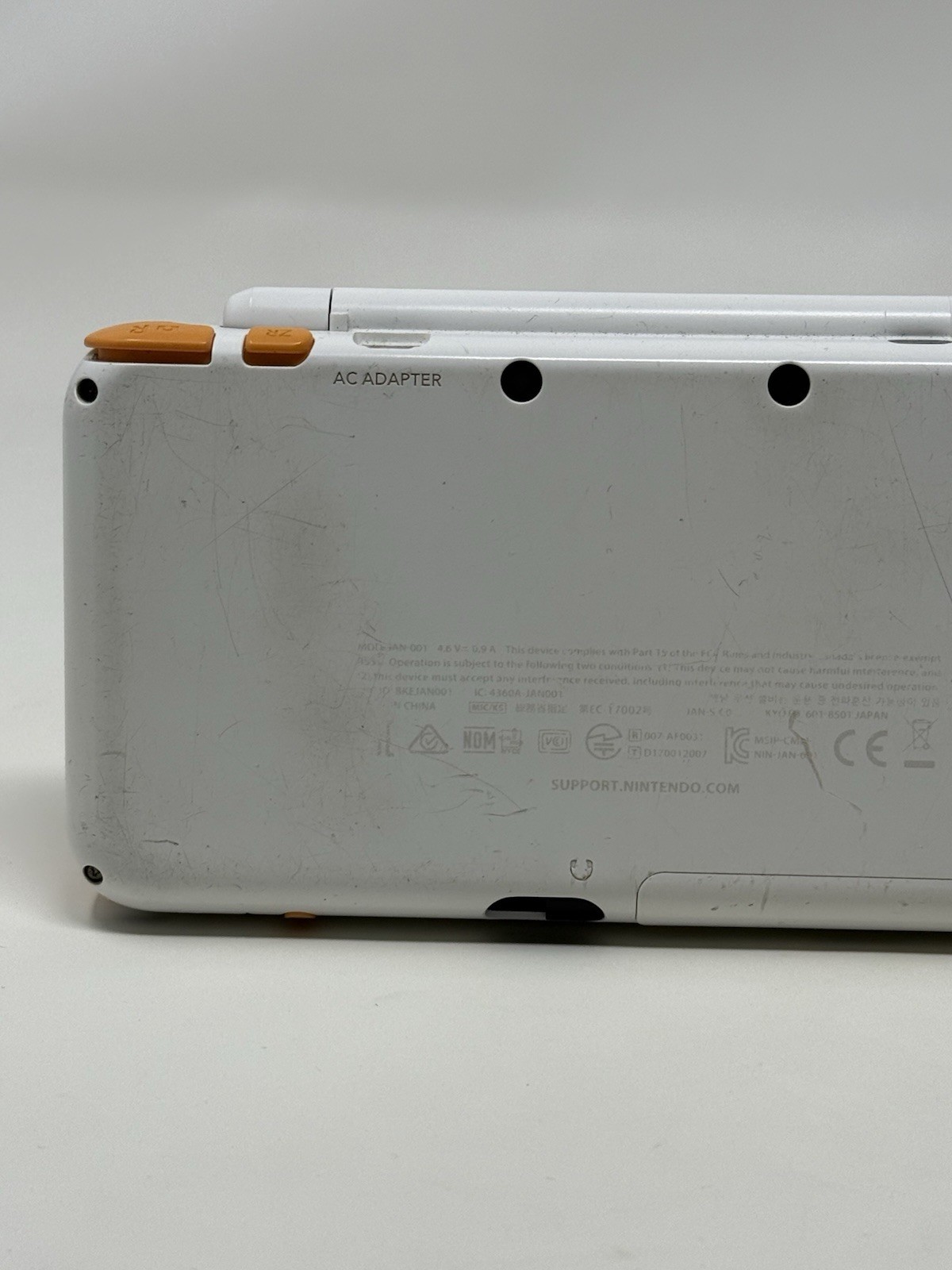 New Nintendo 2DS XL Orange White Handheld USA System w Charger Stylus and Extras