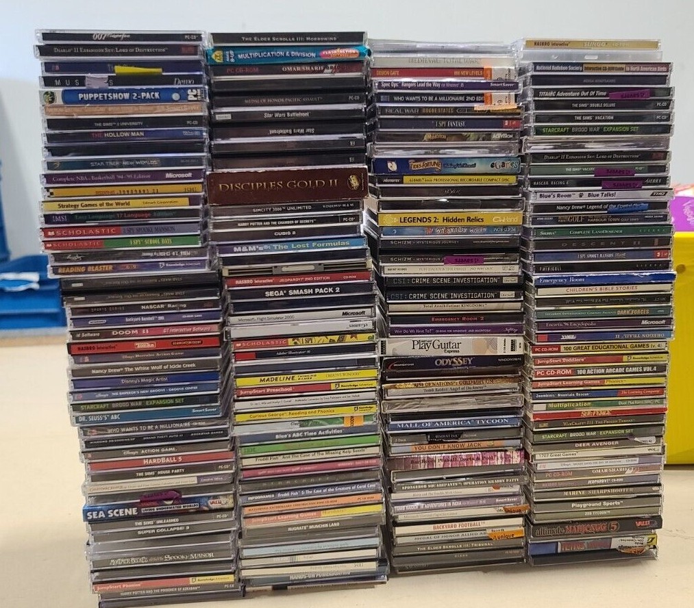 Huge PC Games and Softwares Lot about 80 Discs Free Shipping Random Assorted