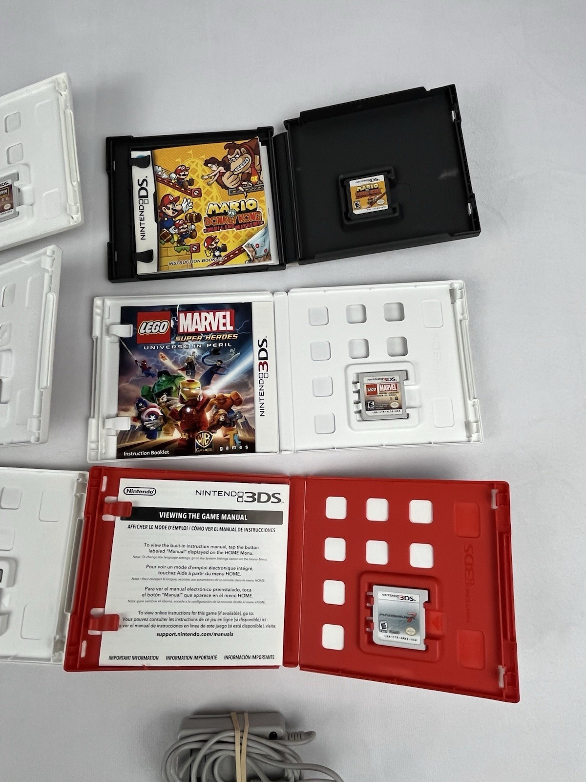 Nintendo 3DS XL Red Bundle w/ Charger, Stylus, SD Card, and 15 DS/3DS Games