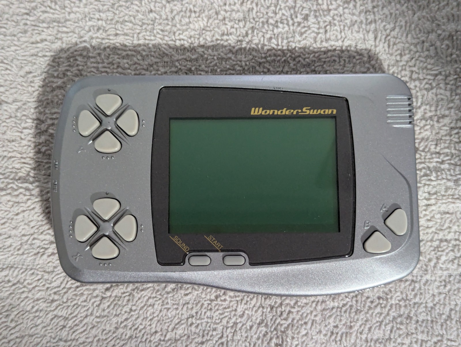 Bandai WonderSwan, Silver. With Digimon