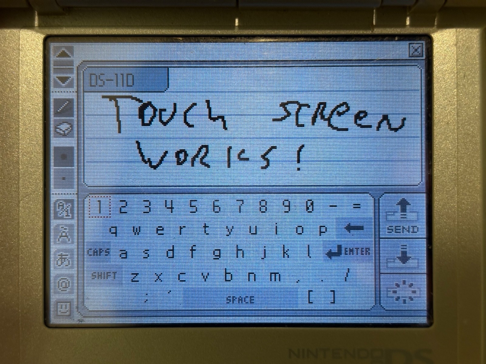 Nintendo DS Silver Handheld System – Fair Condition – TESTED AND WORKING (11D)