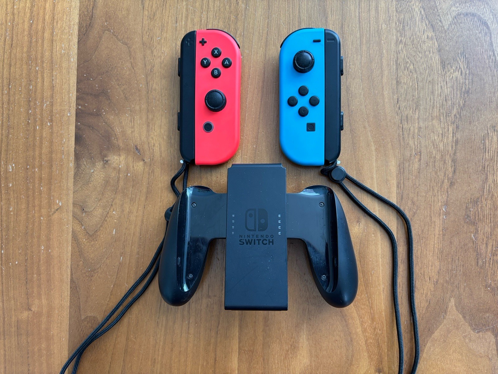 [USED] Nintendo Switch Comfort Grip for Joy Con and Red/Blue Controllers SET