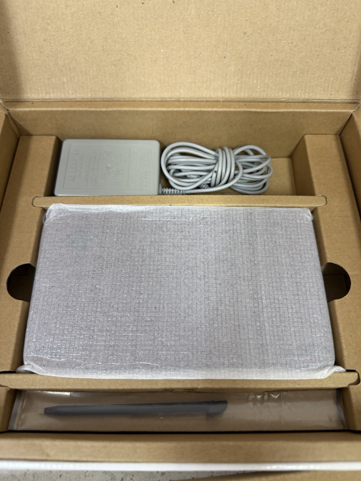 Nintendo DSi XL Launch Edition 256MB Handheld System – Burgundy Bundle Tested