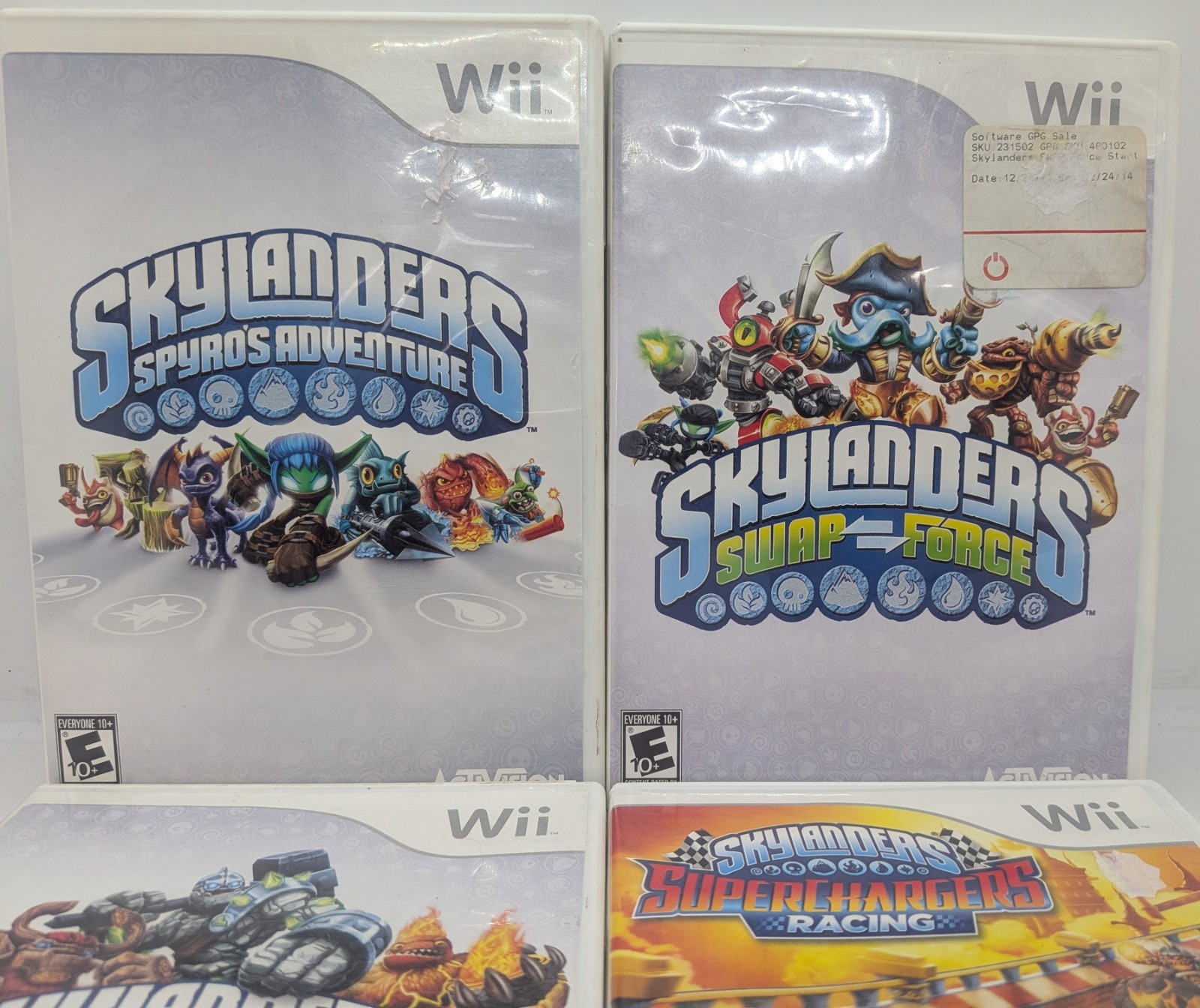 Lot of 4 Wii Skylanders Games Spyros Adventure, Giants, Superchargers,Swap Force