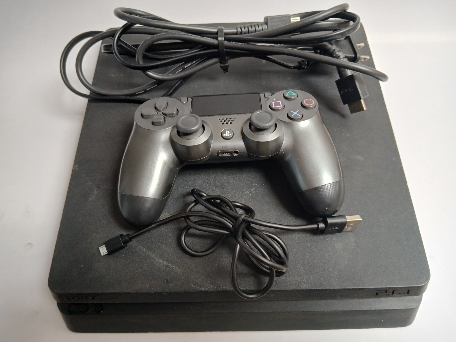Sony PlayStation 4 Slim 1TB Gaming Console with Grey Controller and All Cords