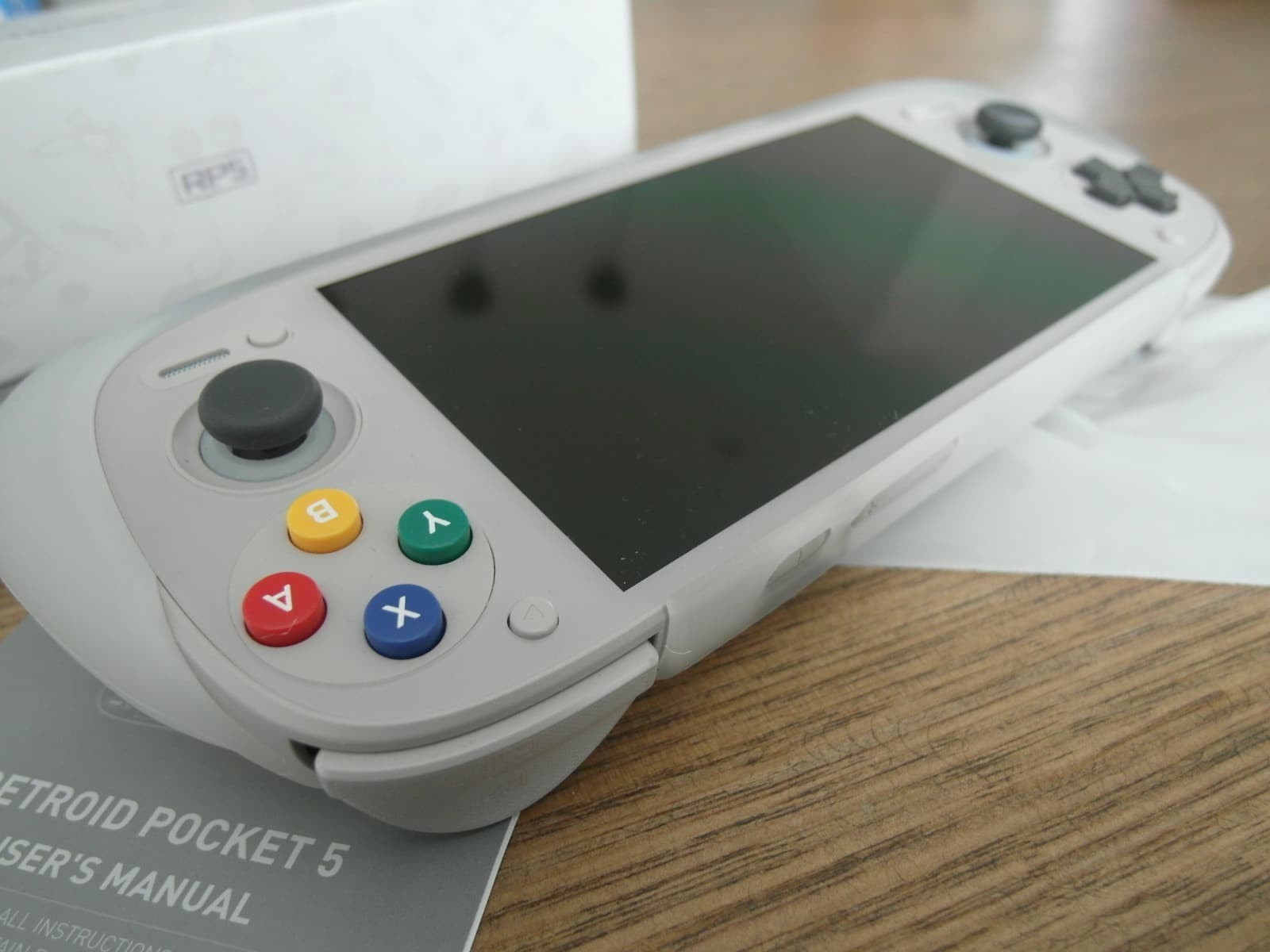 Retroid Pocket 5 with Grip & Carry Case – Complete in Box – Excellent Condition