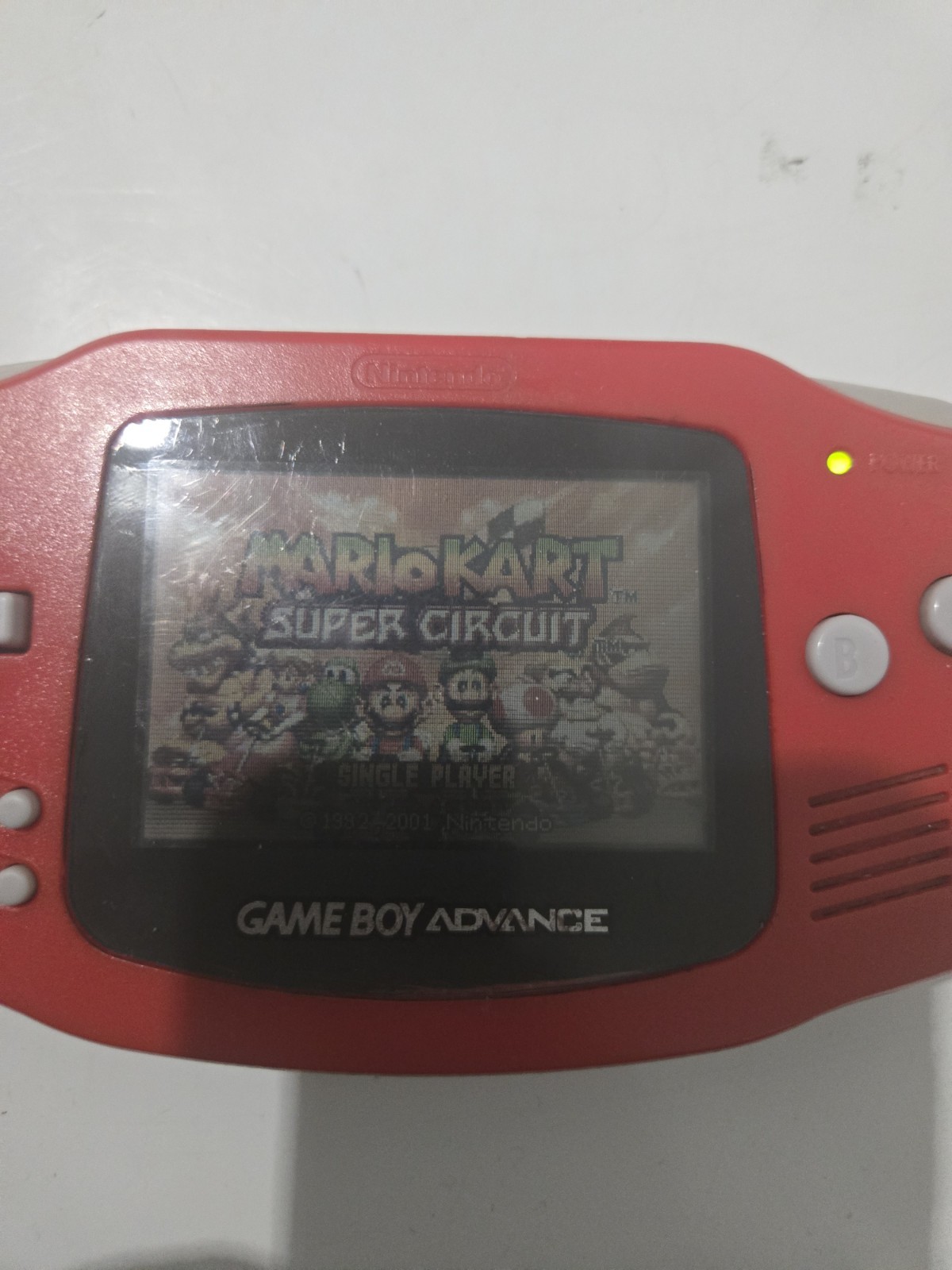 red gameboy advance with 2 games and case tested