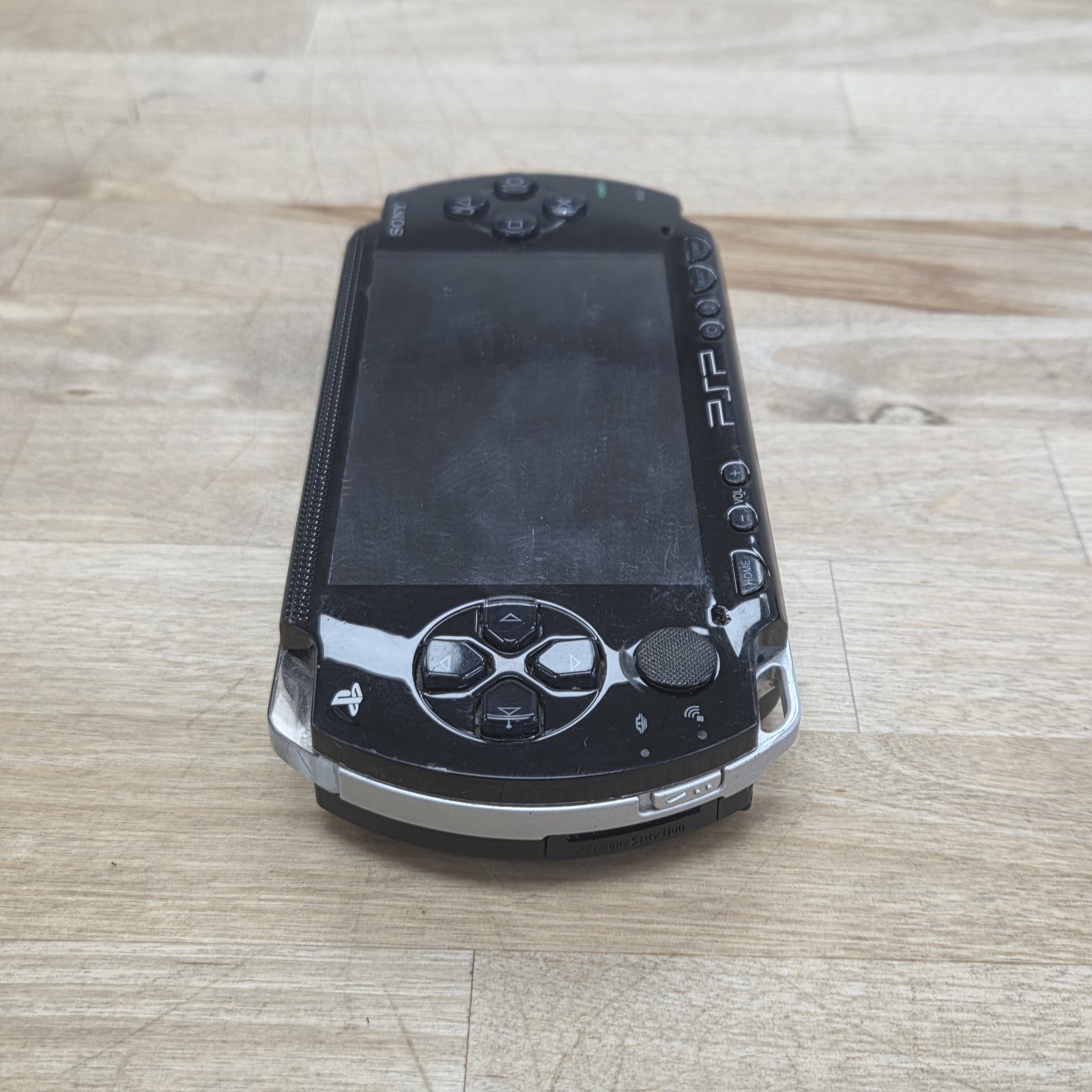 Sony PSP-1001 PlayStation Portable – Black with 8gb Memory Stick Duo & Pwr Cable