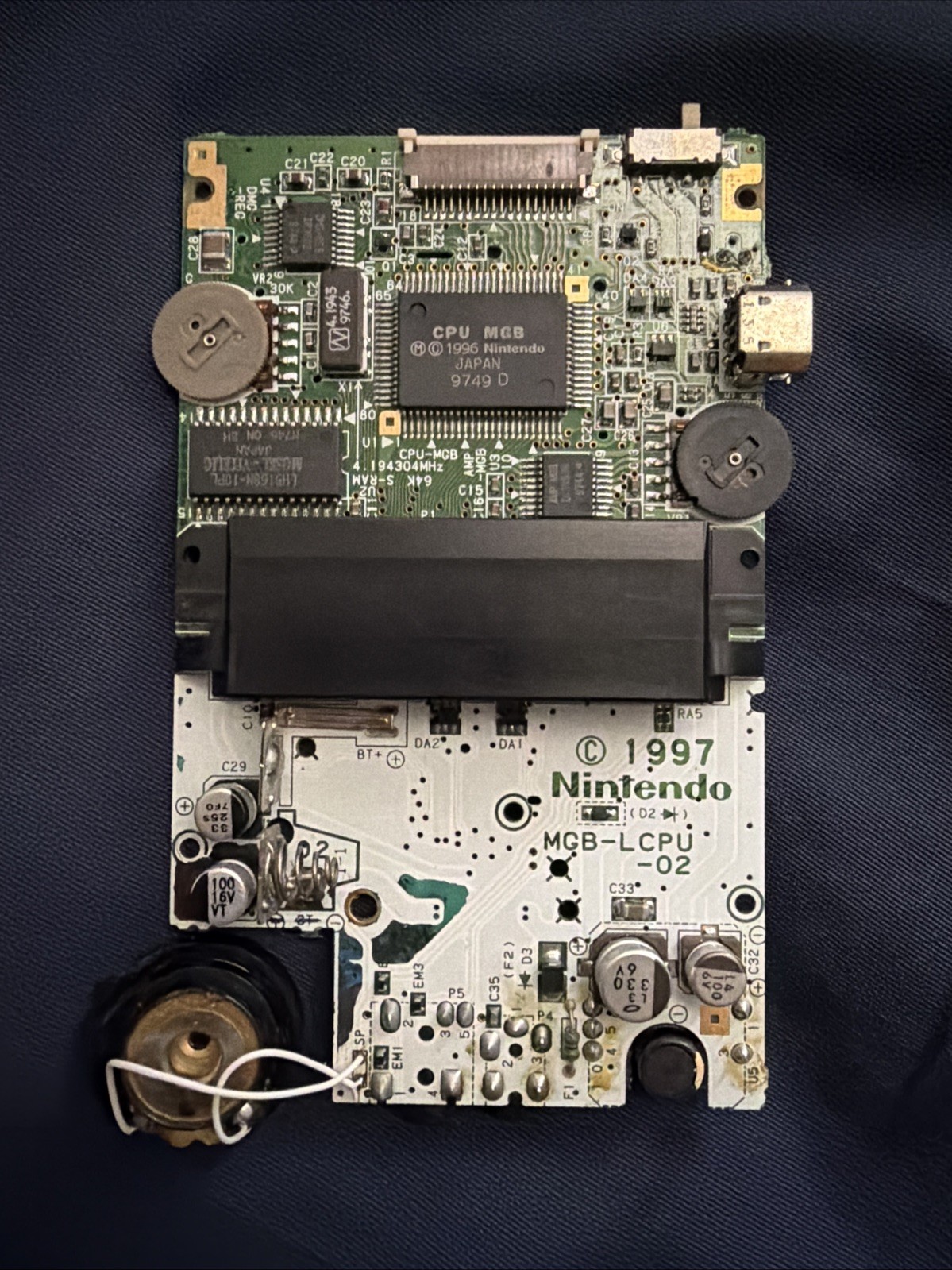 Gameboy Pocket Motherboard w/ Light CORROSSION DAMAGE, WORKS BAD AUDIO, TESTED