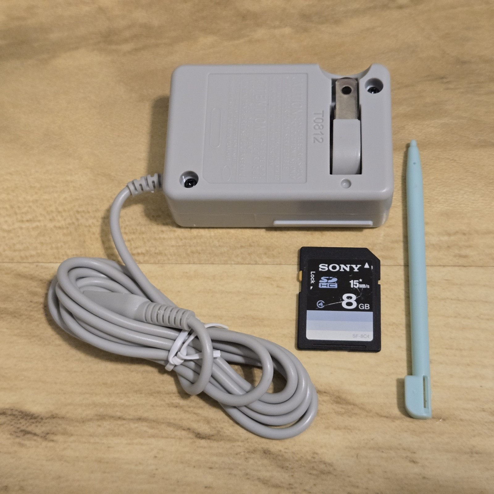 Nintendo DSi Light Blue System w/ Charger, Stylus, Case, Nerf Cover & SD Card