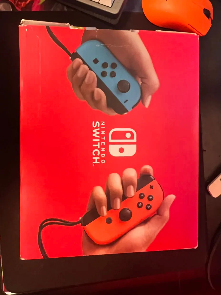 Nintendo Switch 32GB Handheld Console – Neon Red/Neon Blue