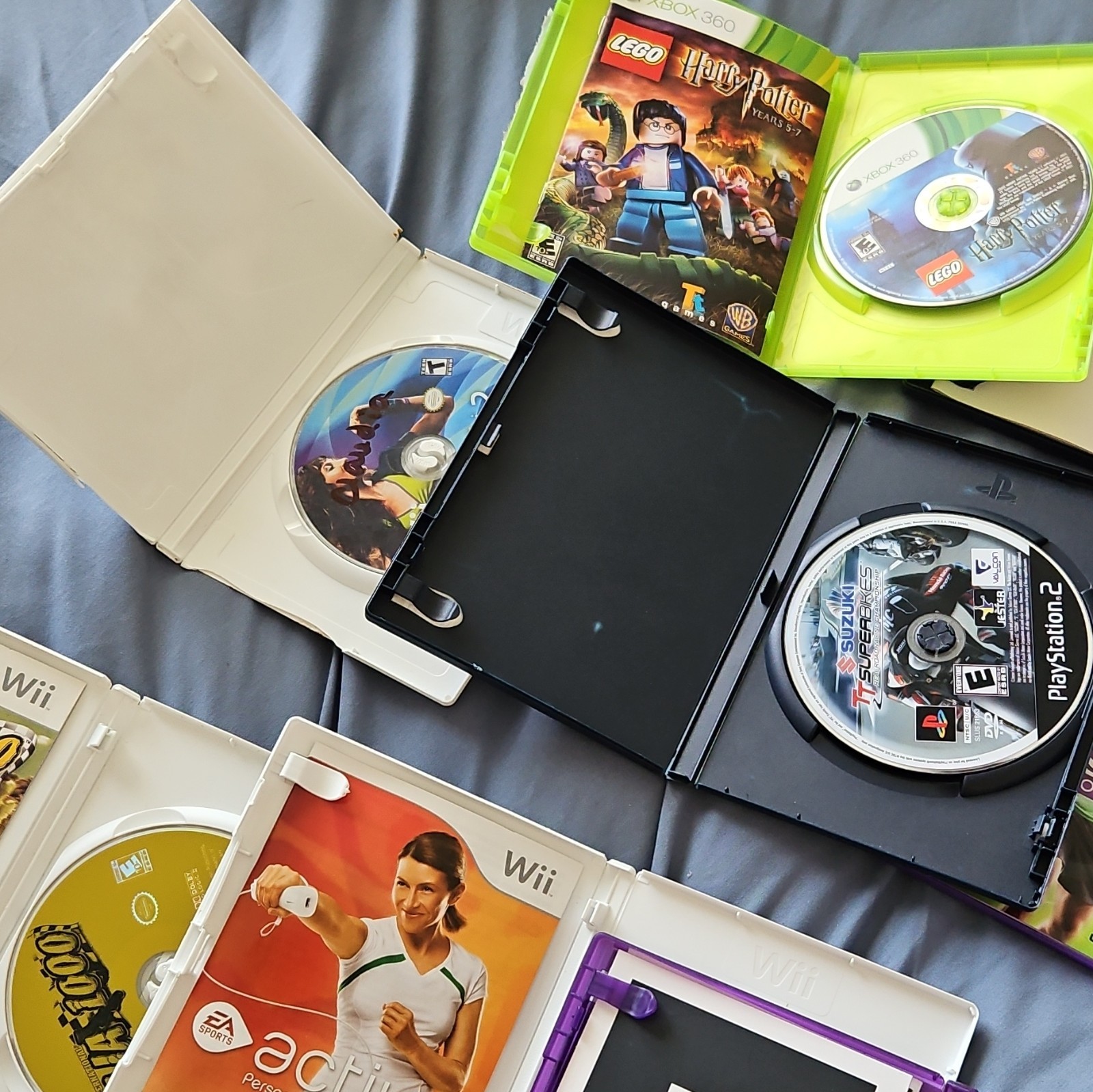 Microsoft Nintendo Mixed Lot Video Games Xbox 360 Kinect Wii PS2. Untested.
