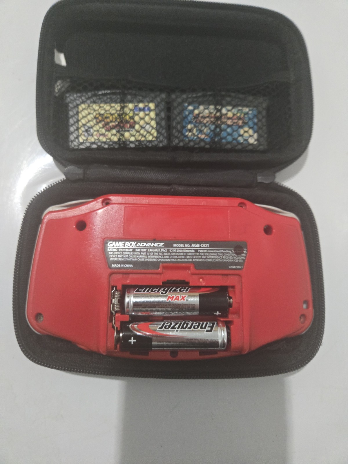 red gameboy advance with 2 games and case tested