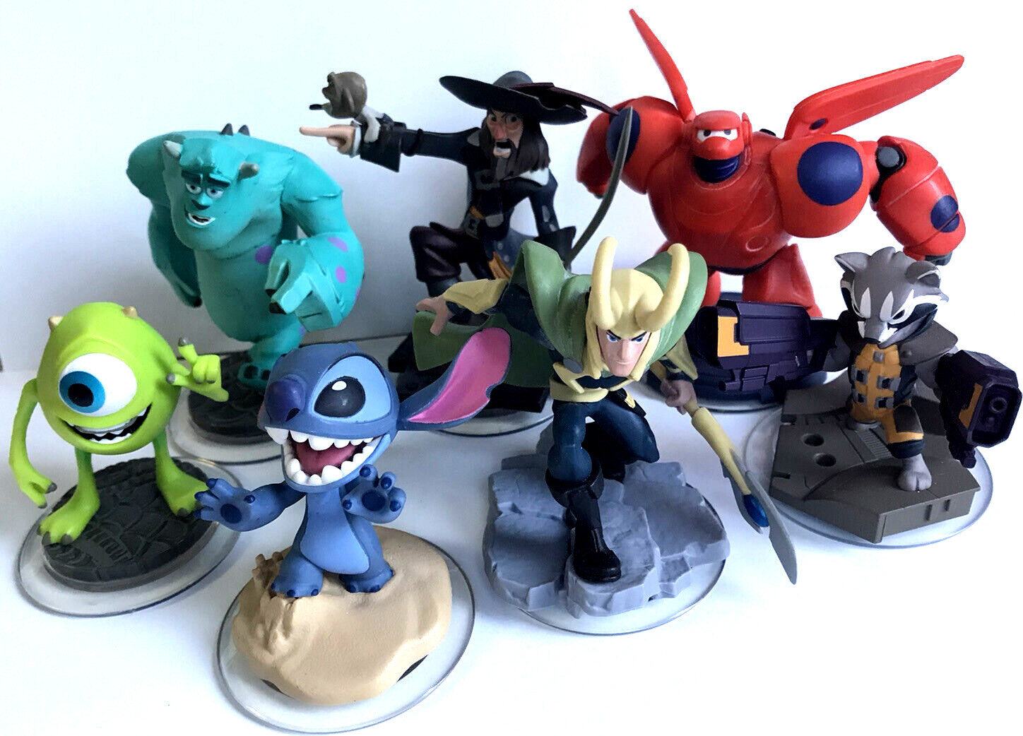 Disney Pixar Infinity Figures (7) Stitch Loki Baymax Barbossa Rocket Mike Sulley