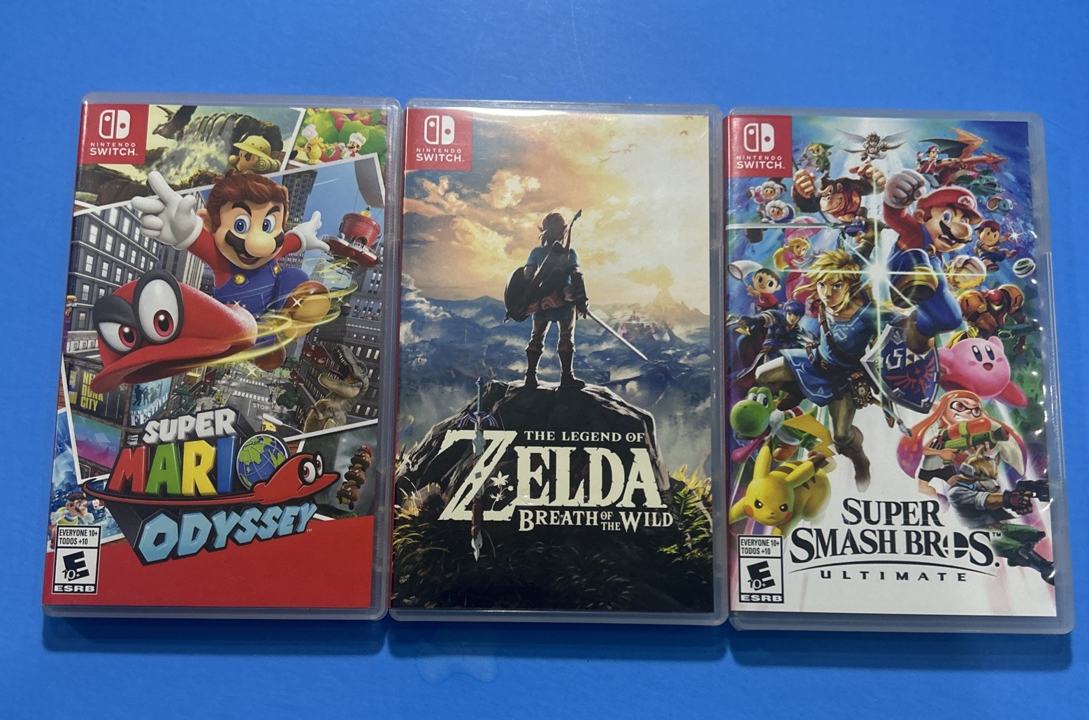 Nintendo Switch with Neon Blue and Neon Red Joy Con Bundle Complete With Games