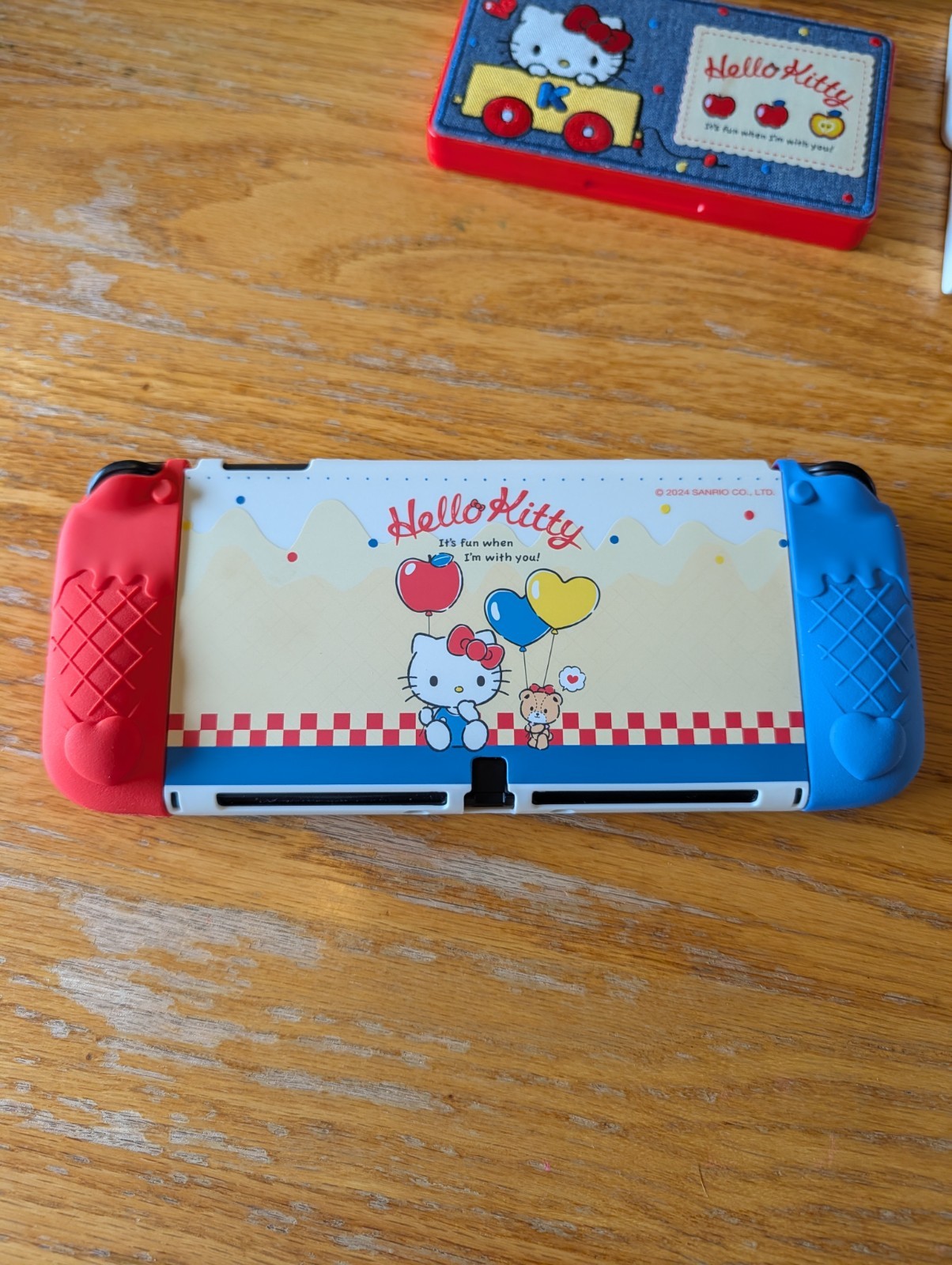 OLED Nintendo Switch + Hello Kitty Accessories