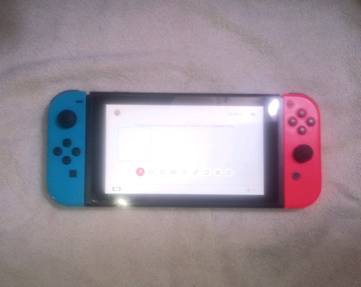 Nintendo Switch with Neon Blue and Neon Red Joy-Con