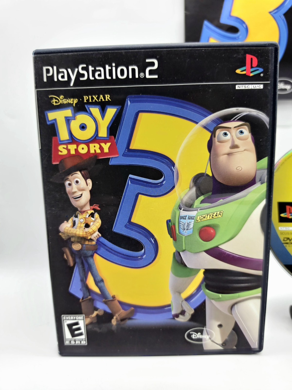 Toy Story 3 PS2 Video Game and Toy Story 3 Dominoes Set Bundle
