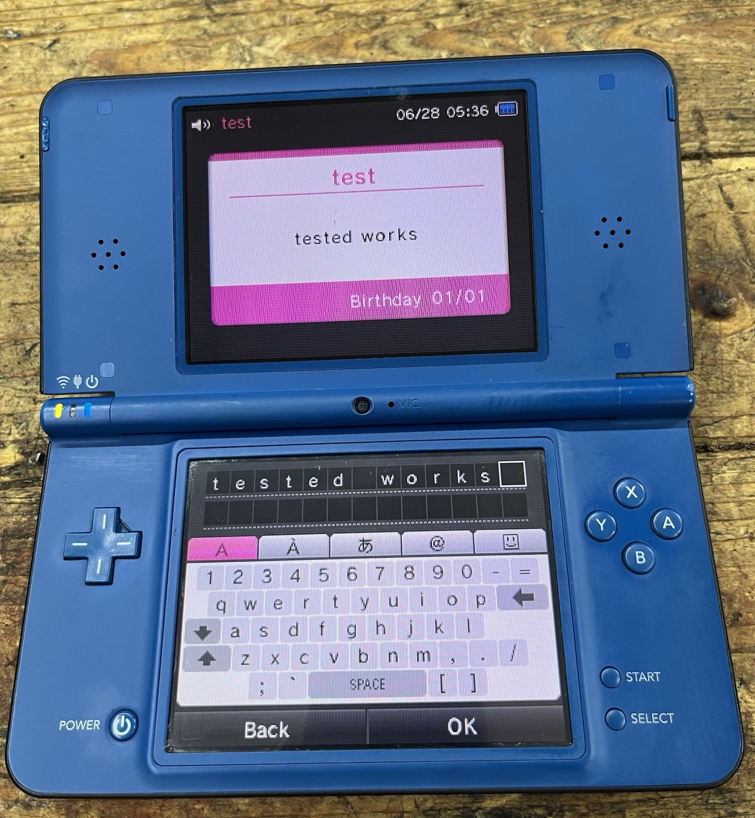 Nintendo DSi XL Blue/Black Handheld Console Wi-Fi Charger Cable & Zoolz Game