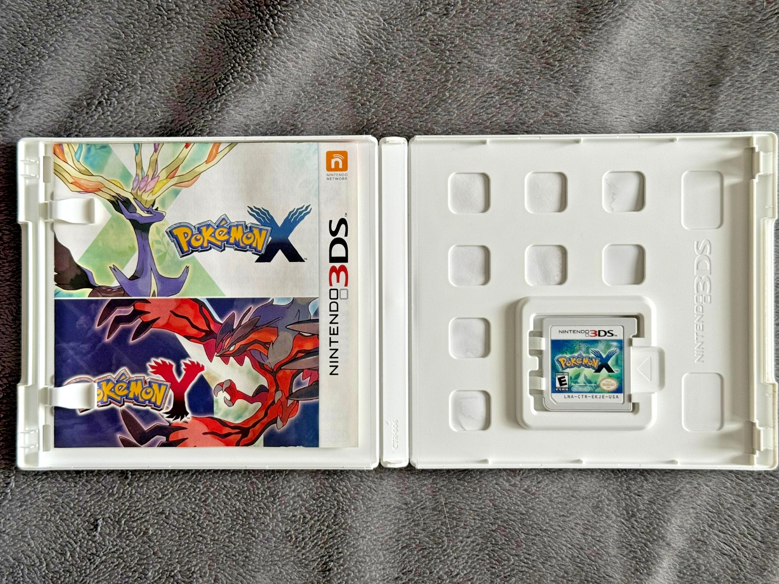 Pokemon X – Nintendo 3DS – CIB Tested Working (Paper Insert Has Water Damage)