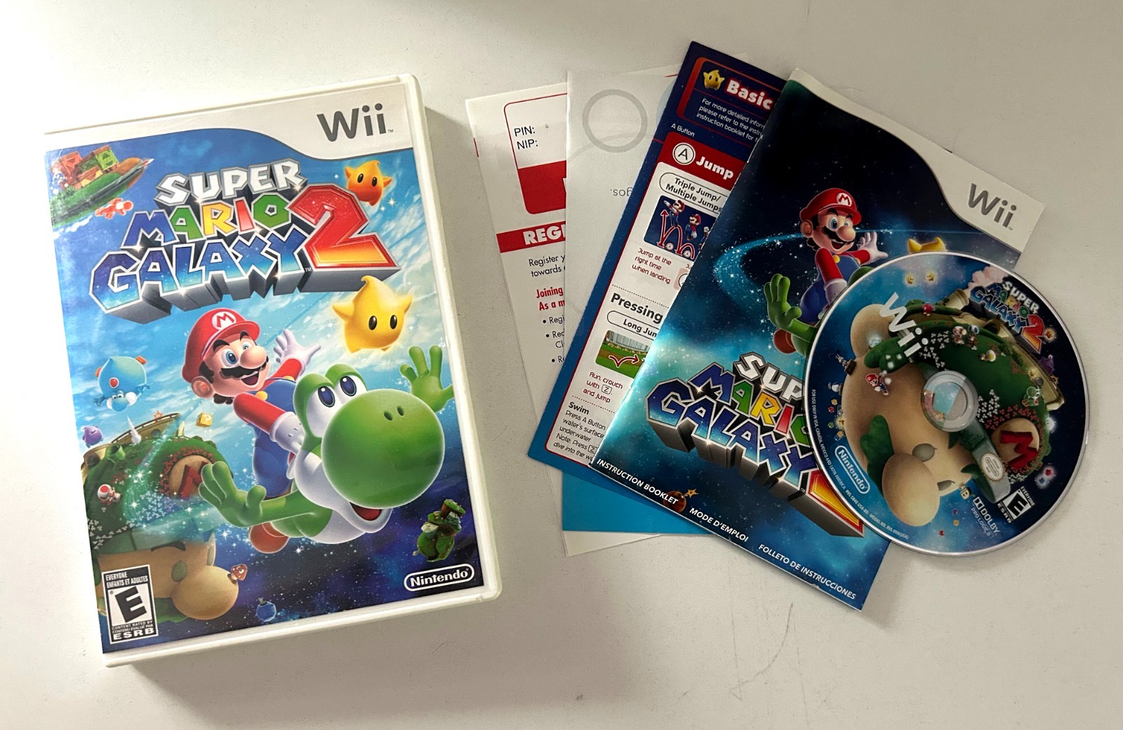 Nintendo Wii Super Mario Galaxy 1 and 2 Bundle with Manual and Inserts Tested