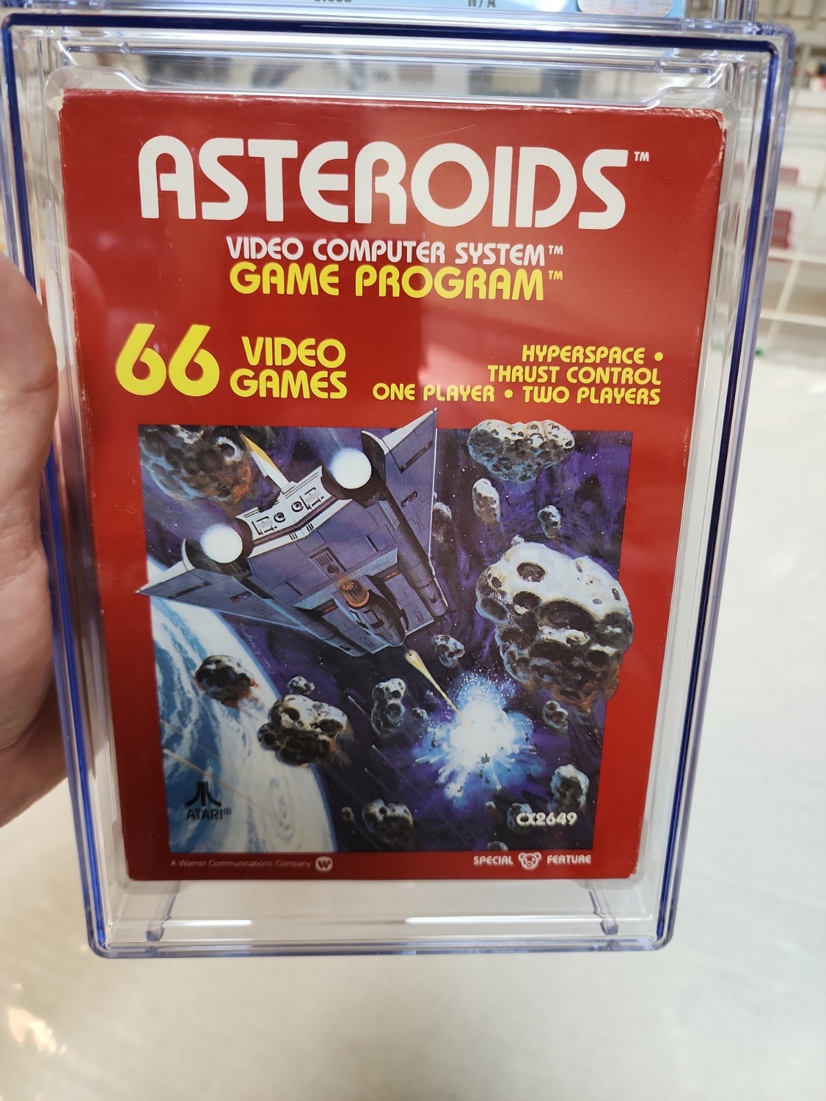 1981 Atari 2600 Asteroids CGC 8.0 Hangtab Version