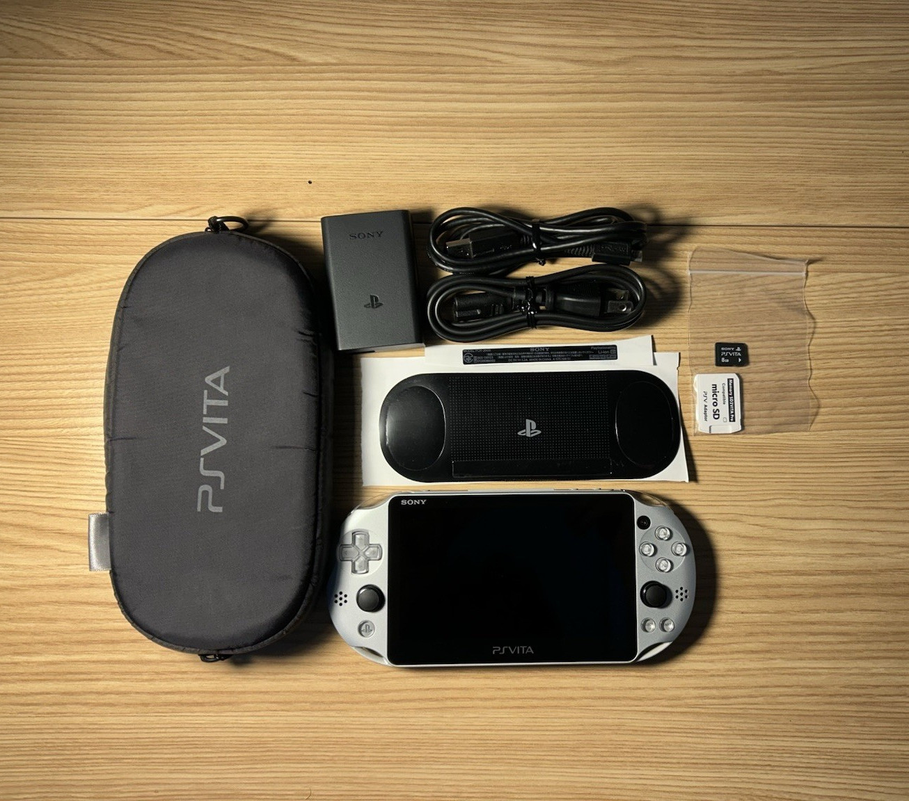 Silver Sony PS Vita PCH-2000 Region Free 8GB Handheld Bundle w/ Accessories