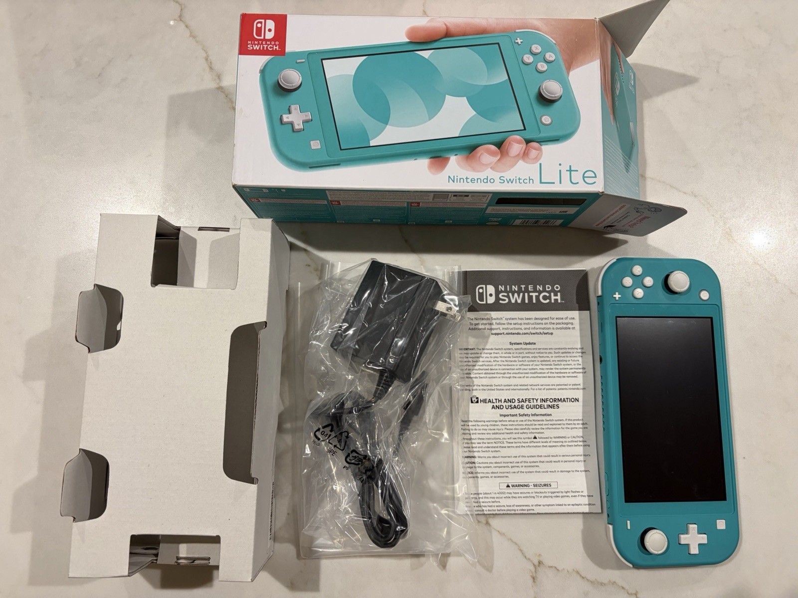 Nintendo Switch Lite Blue Handheld System 32GB 720p Wi-Fi USB-C Headphone Jack