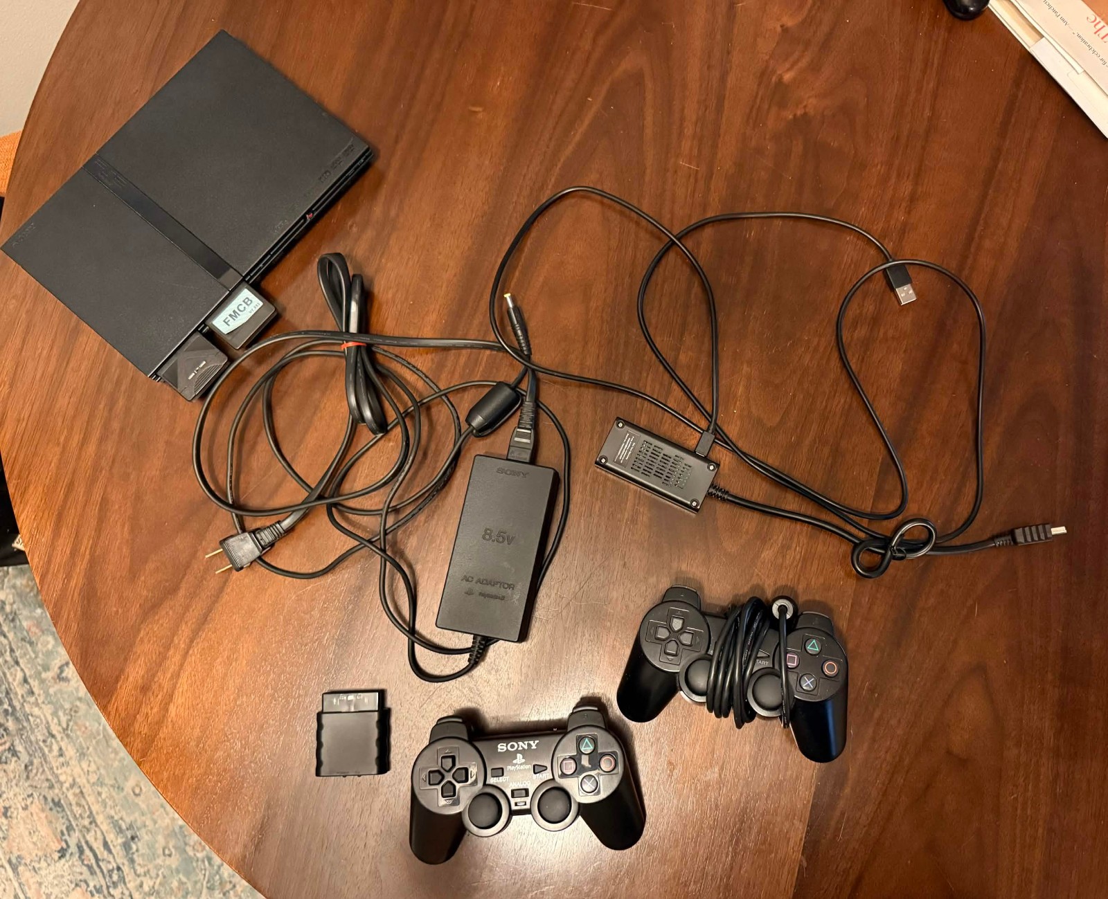 PS2 Slim Black Console – 2 Controllers / HDMI Upscaler / 256mb Card / FMCB Hack
