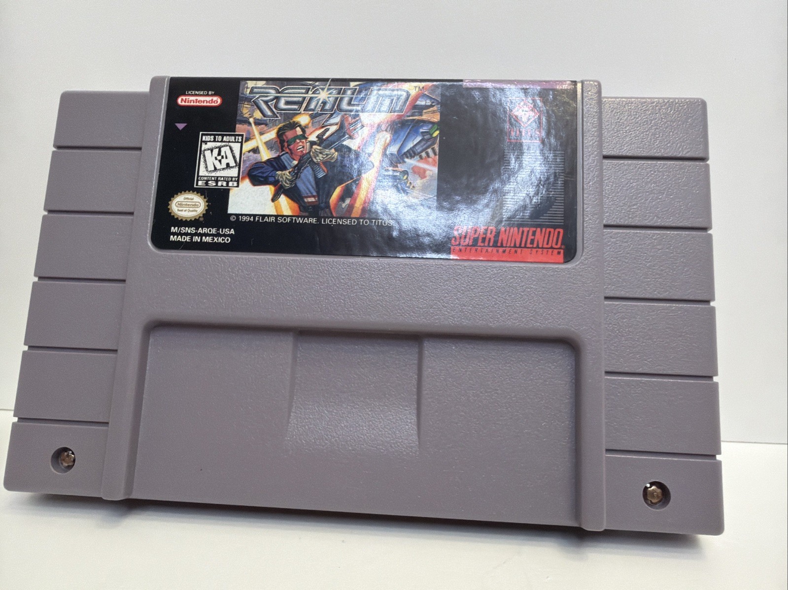 Realm Super Nintendo Game SNES Authentic Very Good Condition w/ Dustcover